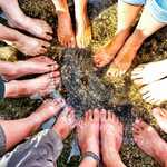 Bare feet in rock pool
